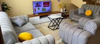 Cozy 2-bedroom apartment with AC and WiFi in this wonderful home away from home.