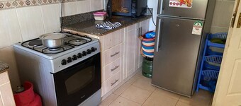 Cozy 2-bedroom apartment with AC and WiFi in this wonderful home away from home.