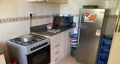Cozy 2-bedroom apartment with AC and WiFi in this wonderful home away from home.