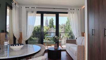 Suite Duplex Terrasse Jacuzzi | Área de estar | TV