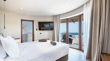 Signature Suite, 1 Queen Bed, Non Smoking, Sea View | Minibar, in-room safe, laptop workspace, blackout curtains