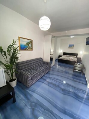 Deluxe vierpersoonskamer | Luxe beddengoed, individueel gedecoreerd, individueel gemeubileerd