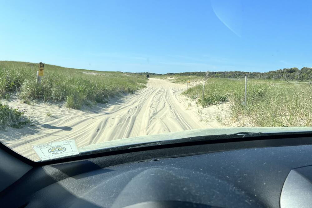 Central Location and Walk to Beach! Fire Pit, Outdoor Shower, and Gas Grill!