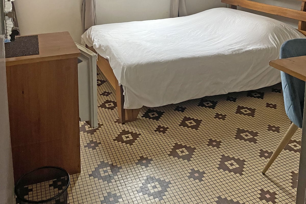 Comfort Room, Garden View | 1 bedroom, in-room safe, desk, laptop workspace