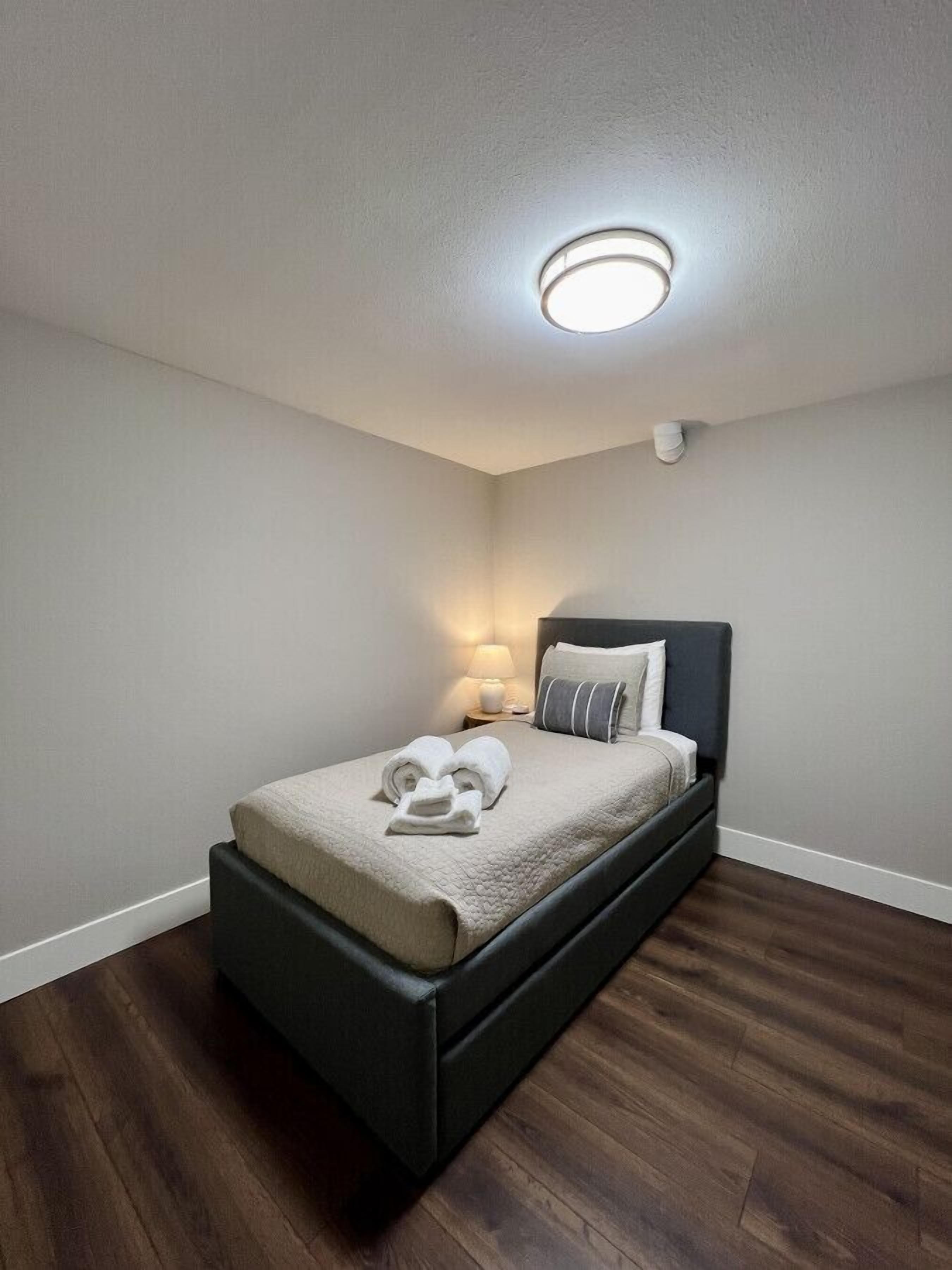 Lower level twin bed with twin trundle to sleep 2