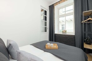 1 slaapkamer, een strijkplank/strijkijzer, wifi, beddengoed