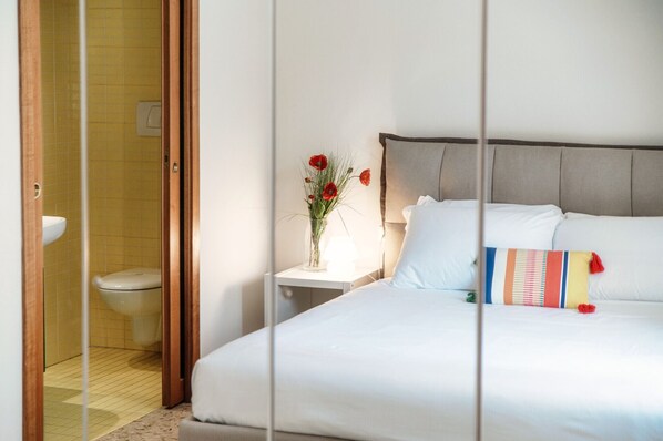 2 habitaciones, tabla de planchar con plancha, wifi y ropa de cama