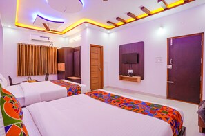 Egyptian cotton sheets, premium bedding, in-room safe, soundproofing - Fabhotel Sri Ram Comforts (Bengaluru)