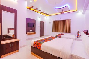Egyptian cotton sheets, premium bedding, in-room safe, soundproofing - Fabhotel Sri Ram Comforts (Bengaluru)