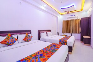 Egyptian cotton sheets, premium bedding, in-room safe, soundproofing - Fabhotel Sri Ram Comforts (Bengaluru)