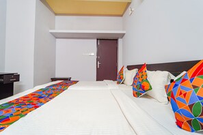 Egyptian cotton sheets, premium bedding, in-room safe, soundproofing - Fabexpress Its South East Residency (Chennai)