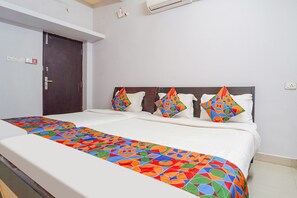 Egyptian cotton sheets, premium bedding, in-room safe, soundproofing - Fabexpress Its South East Residency (Chennai)