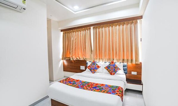 Egyptian cotton sheets, premium bedding, in-room safe, free WiFi - Fabhotel Vishala Inn (Ahmedabad)