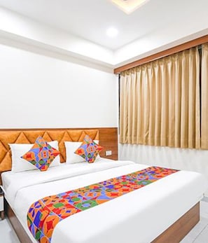 Egyptian cotton sheets, premium bedding, in-room safe, free WiFi - Fabhotel Vishala Inn (Ahmedabad)