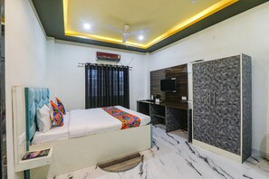 Habitación Deluxe | Sábanas de algodón egipcio, ropa de cama de alta calidad, caja fuerte