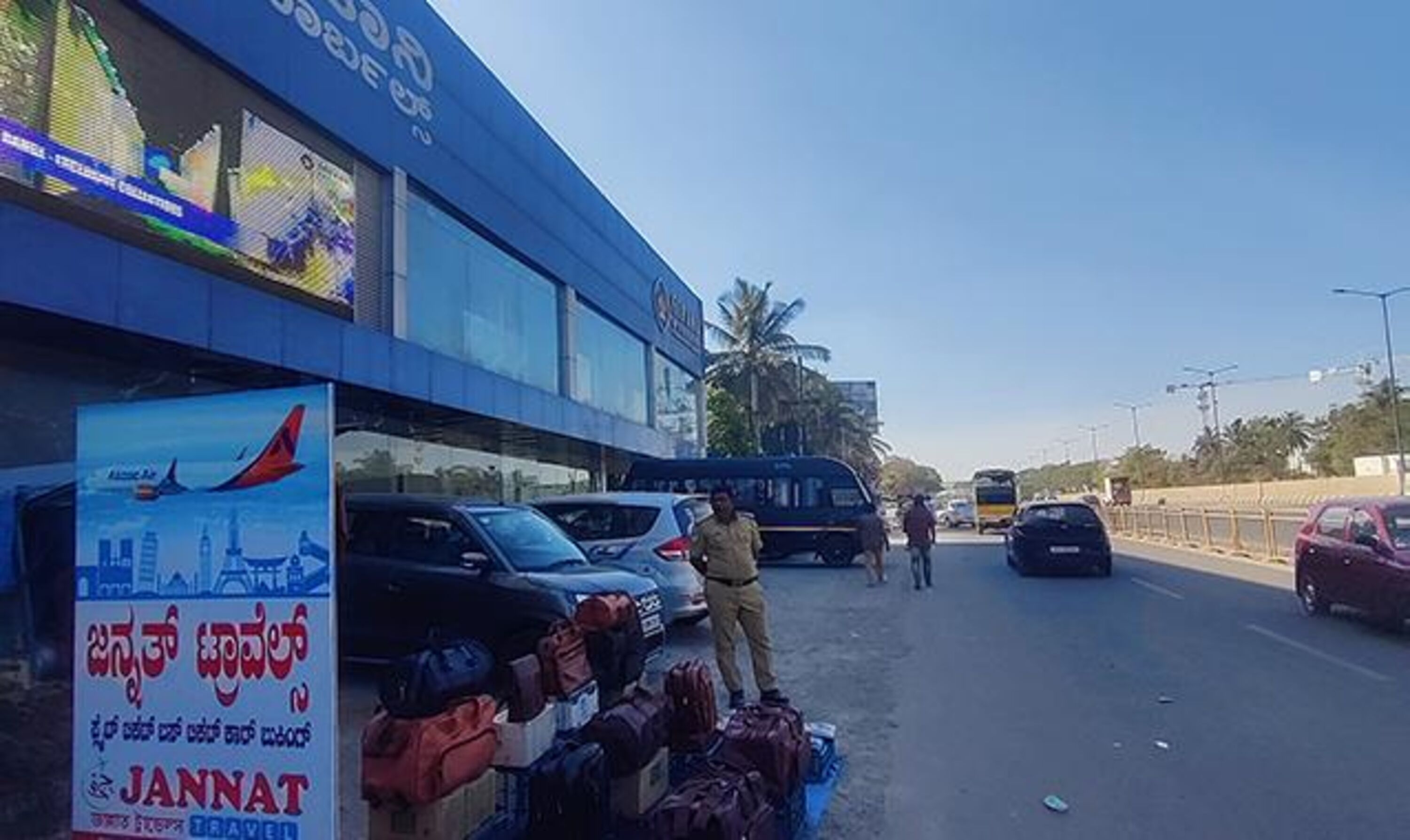 A travel agency with a signboard advertising JANNAT.