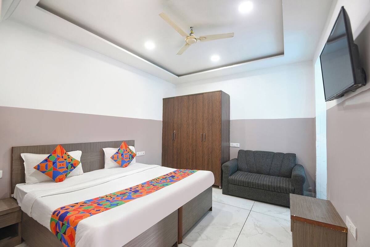 Habitación Deluxe | Sábanas de algodón egipcio, ropa de cama de alta calidad, caja fuerte