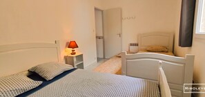 2 habitaciones y cuna de viaje 