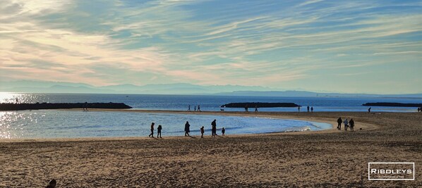 Walking along the beach, guests can enjoy the serene atmosphere and scenic views.