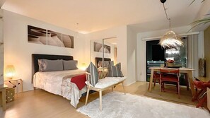 1 bedroom, desk, iron/ironing board, travel crib