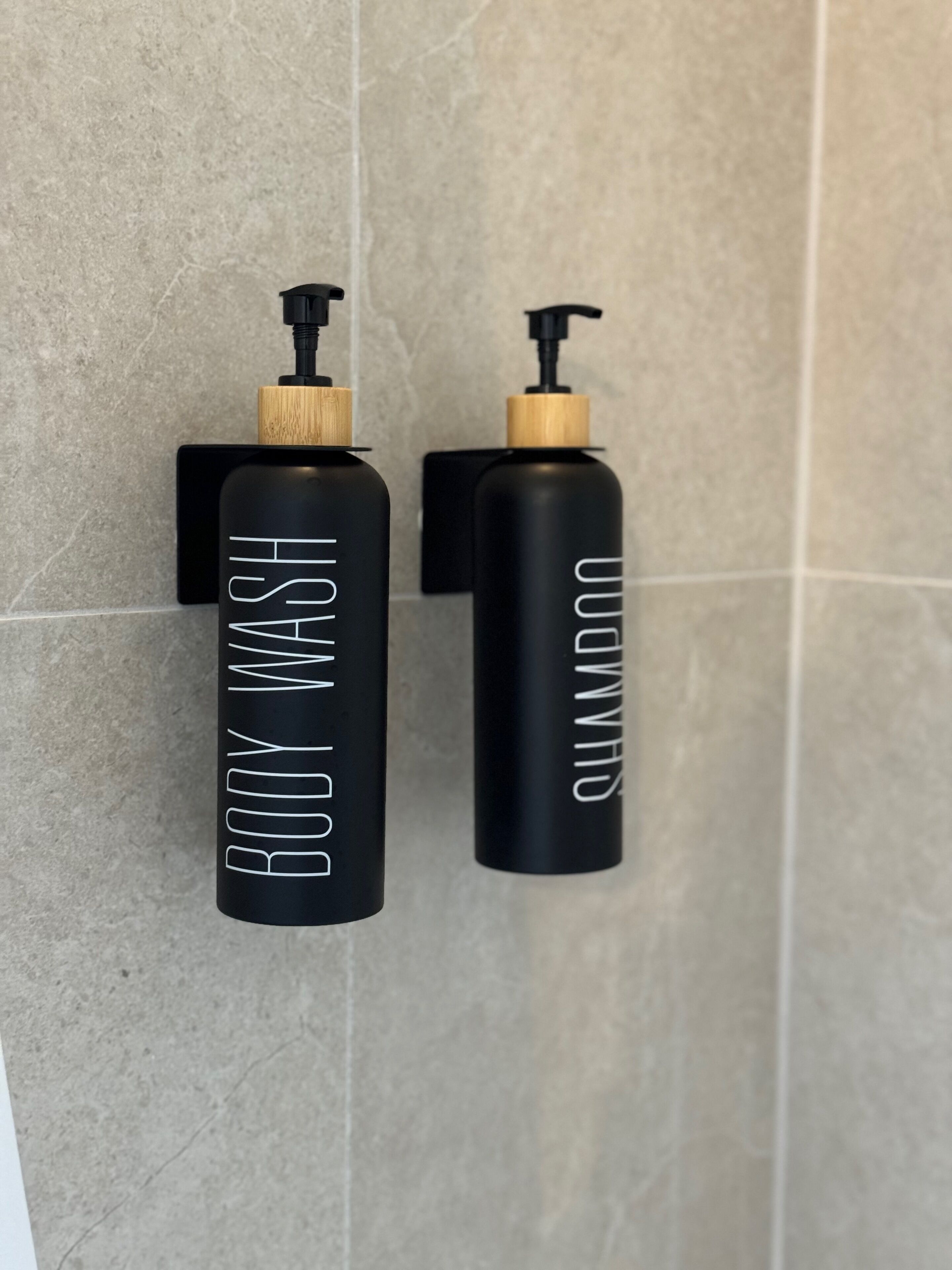 Bathtub, hair dryer, towels, toilet paper