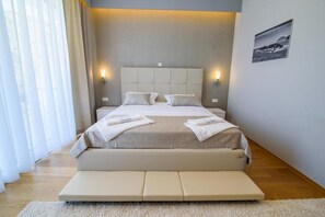 5 quartos, ferros/tábuas de passar roupa, berço de viagem, Wi-Fi