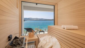 A wooden deck with a sauna, a grill, and a view of the sea. - Villa Dragica - Private villa with pool, Sibenik (Zaboric)