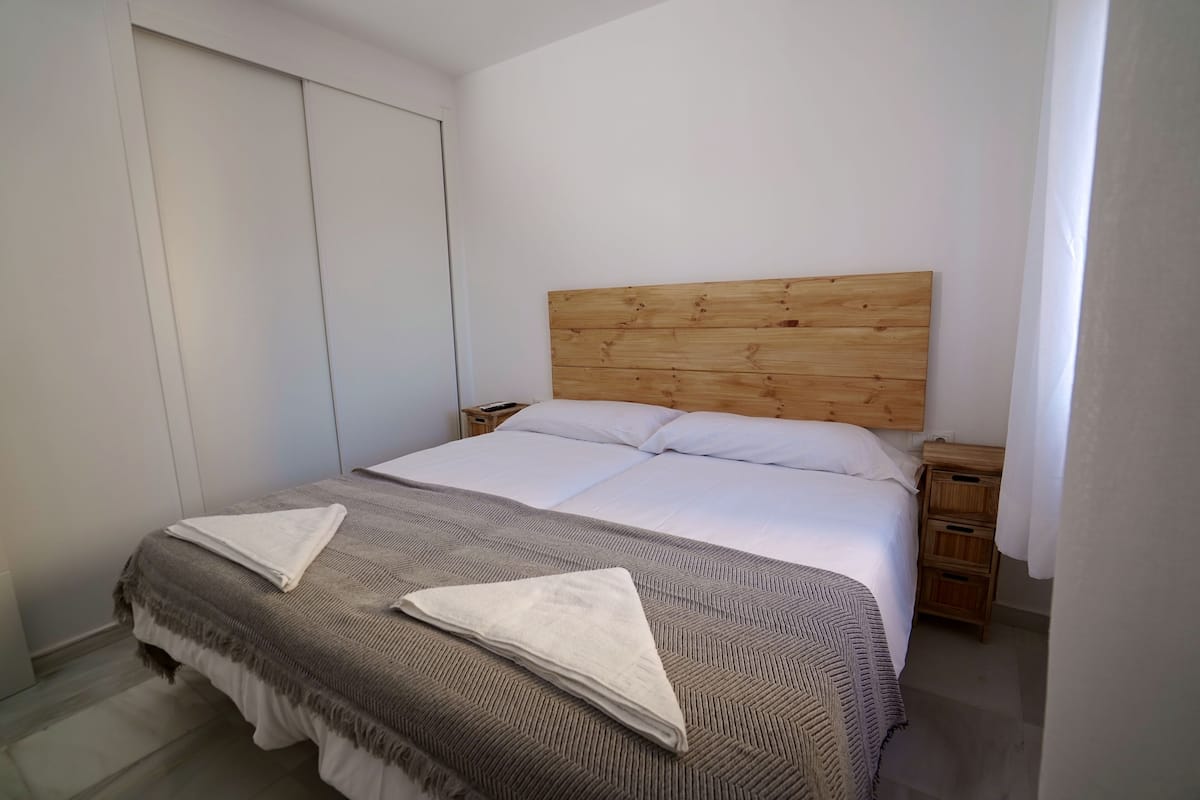 Family Apartment, Non Smoking, Microwave | 1 bedroom, blackout drapes, iron/ironing board, free WiFi