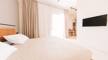 Habitación Business individual | Ropa de cama de alta calidad, colchones viscoelásticos, escritorio