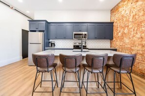 Microwave, dishwasher, toaster, cookware/dishes/utensils