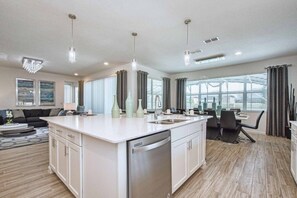 Private kitchen - Beautiful House, Gourmet Grilll, Jacuzzi And Game Room !!! 6 Bedroom Home by RedAwning (Kissimmee)