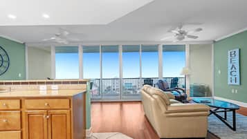 Comfort Condo, 2 Bedrooms, Balcony, Beach View | Living room | 55-inch Smart TV with digital channels