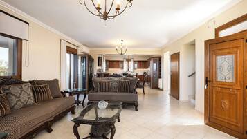 Family Villa | Living area | 55-inch Smart TV with digital channels, Netflix, streaming services