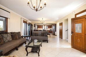 Family Villa | Living area | 55-inch Smart TV with digital channels, Netflix, streaming services - Villa Aris (Rethymno)