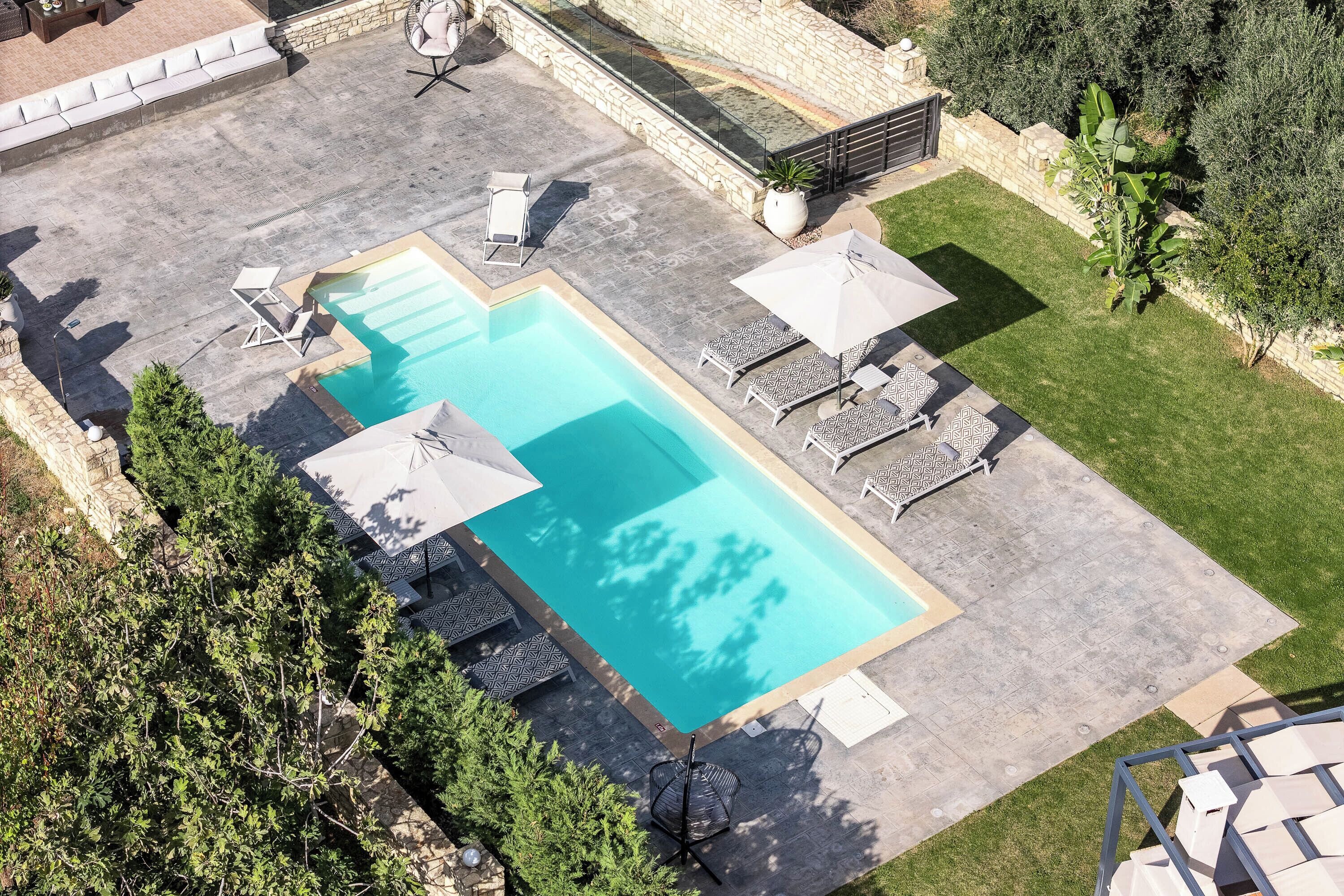 Seasonal outdoor pool, pool umbrellas, sun loungers