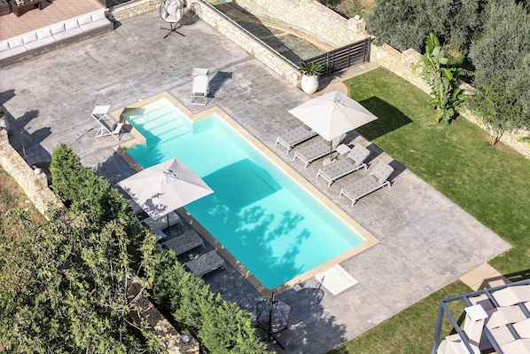 Seasonal outdoor pool, pool umbrellas, pool loungers