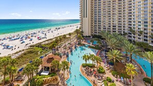 A hotel with a pool, beach, and ocean view. - Ocean view condo w/ pool and hot tub (Panama City Beach)
