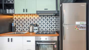 Standard Apartment | Private kitchen | Espresso maker, electric kettle, dining tables