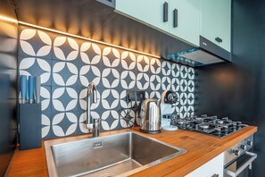 Standard Apartment | Private kitchen | Espresso maker, electric kettle, dining tables