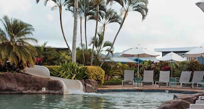 Poipu Sunset Hale: Spacious 4BR Home with Tiki Bar, AC, & Beach Club Access