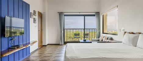 Habitación doble Deluxe, balcón, vista al mar | Cortinas blackout, wifi gratis y ropa de cama