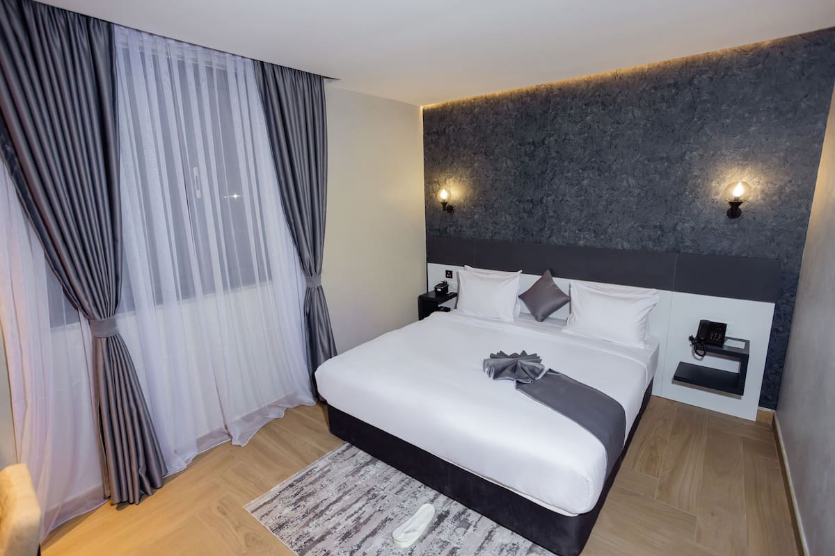 In-room safe, desk, laptop workspace, blackout curtains