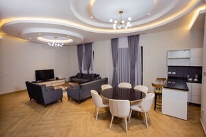 Deluxe Twin Room, 2 Bedrooms, City View | In-room safe, desk, laptop workspace, blackout drapes