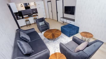 Télévision à écran plat de 55 pouces avec chaînes par câble, télévision