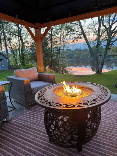 Stunning Century Riverfront Estate with sweeping waterfront views.