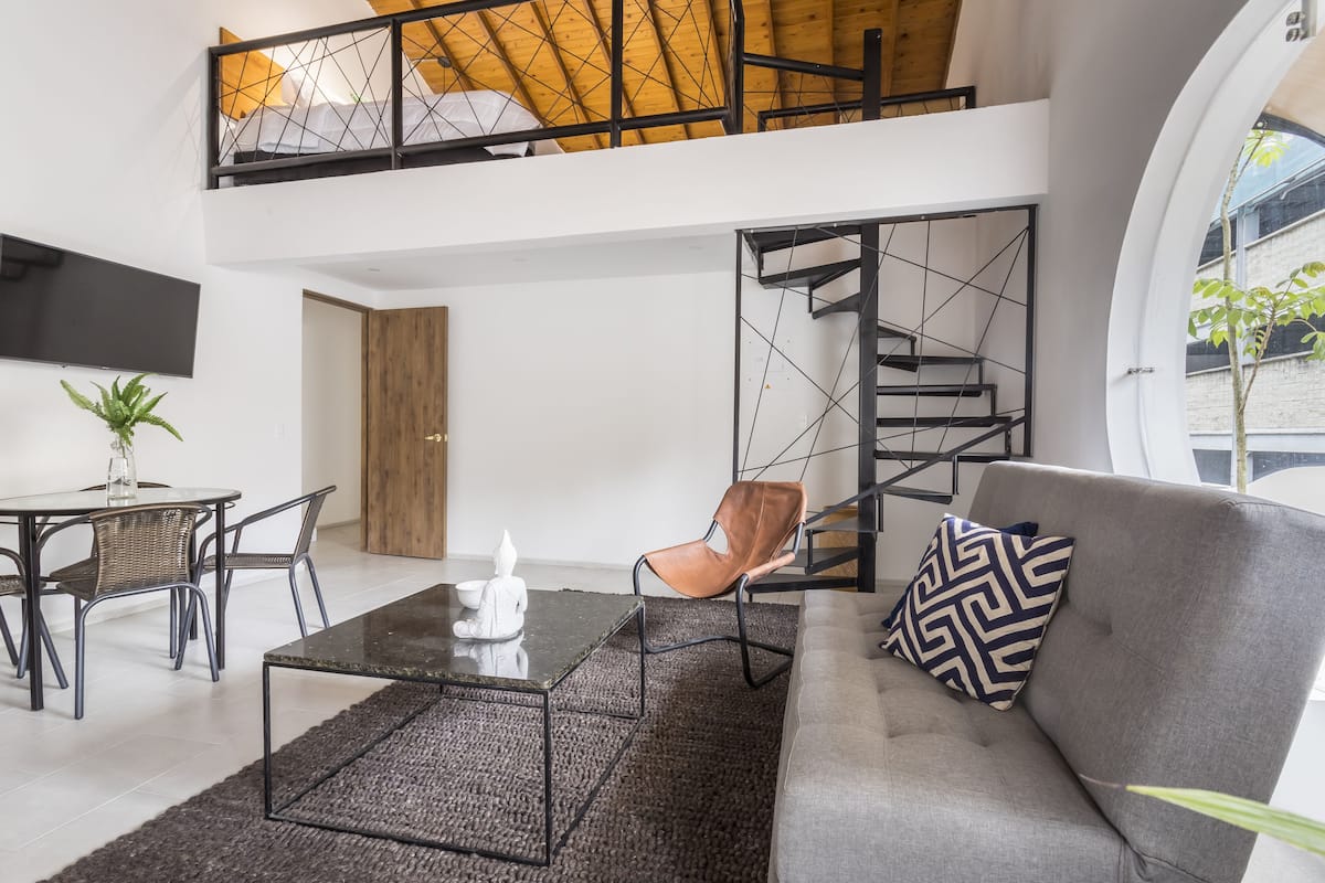 Appartement (Mezzanine 302) | Coin séjour
