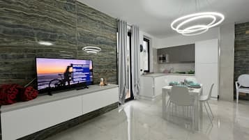 Classic Apartment (Interno 3) | Living area | Plasma TV
