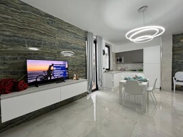 Classic Apartment (Interno 3) | Living area | Plasma TV