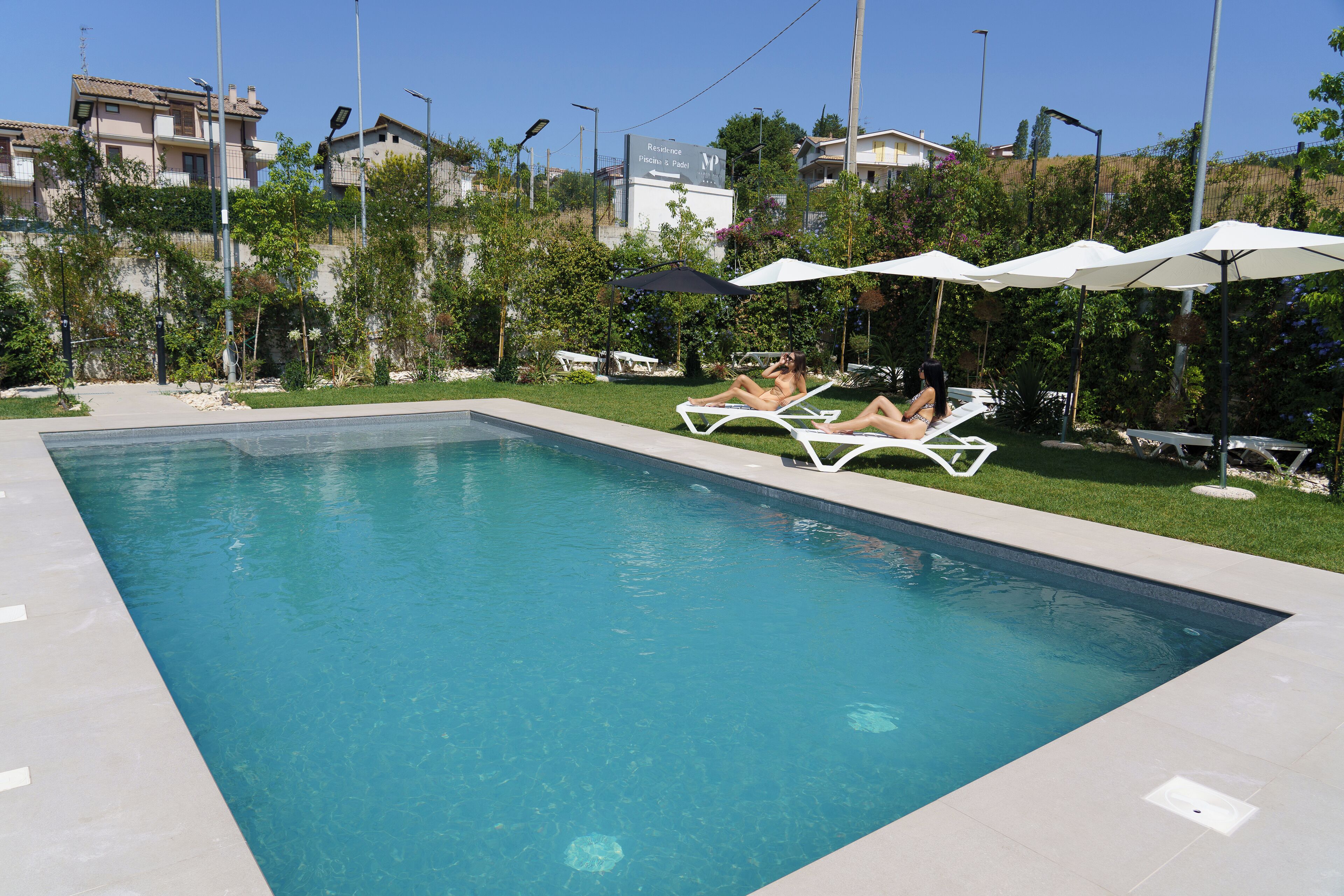 Outdoor pool, pool umbrellas, sun loungers