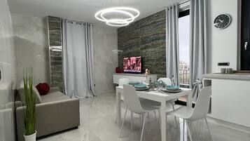 Classic Apartment (Interno 3) | Living area | Plasma TV